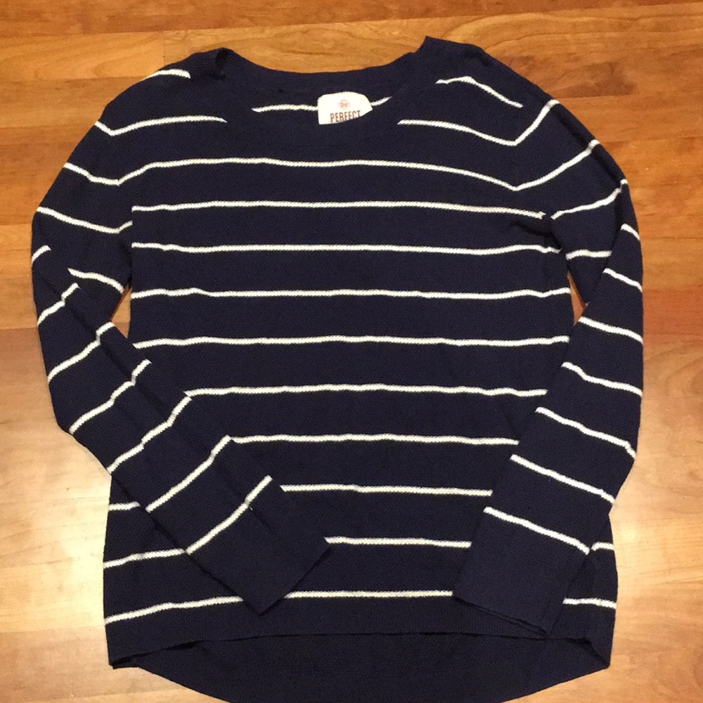 Blue and white sweater.